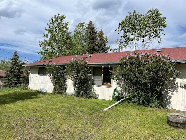 8427 S Custer Ln, Evergreen, CO 80439 - back of property featuring a lawn