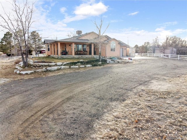 view of front of home featuring covered porch