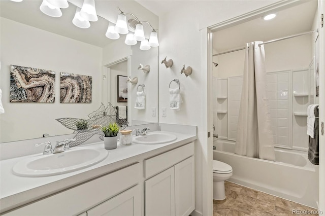 full bathroom with vanity, toilet, and shower / bath combination with curtain