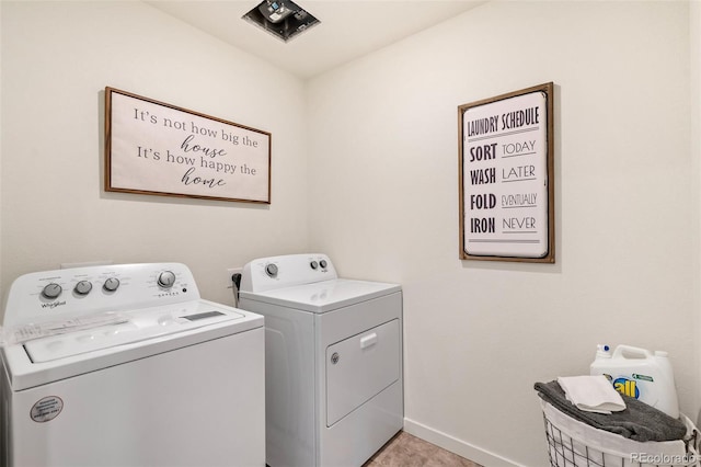 washroom featuring separate washer and dryer