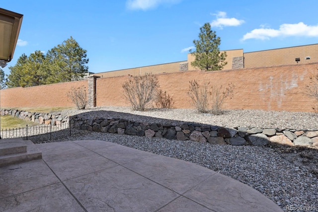 view of patio with a fenced backyard