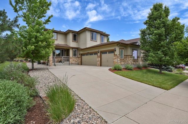 24269 E Arapahoe Pl, Aurora, CO 80016 - prairie-style home with driveway, a front yard, a garage, and a porch