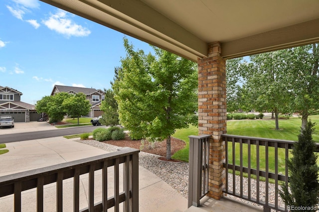 24269 E Arapahoe Pl, Aurora, CO 80016 - covered porch featuring a yard