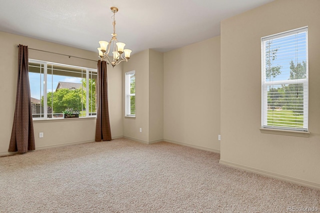 24269 E Arapahoe Pl, Aurora, CO 80016 - carpeted spare room with a chandelier and baseboards