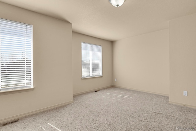 24269 E Arapahoe Pl, Aurora, CO 80016 - carpeted spare room with baseboards