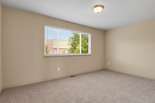 24269 E Arapahoe Pl, Aurora, CO 80016 - carpeted empty room featuring baseboards
