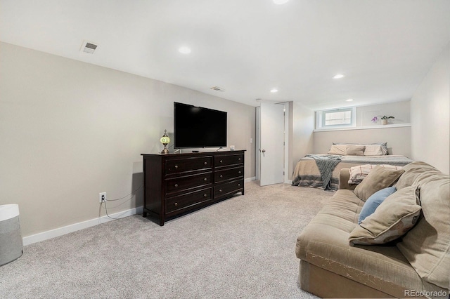 bedroom with light colored carpet, recessed lighting, baseboards, and visible vents