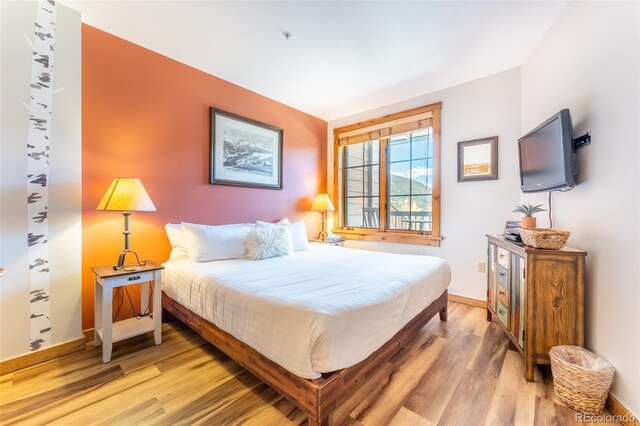 150 Dercum Sq Unit 8501, Keystone, CO 80435 - bedroom featuring baseboards and light wood-style flooring