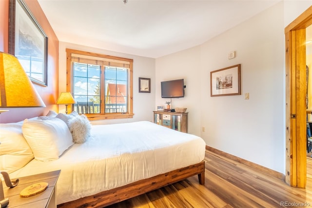 150 Dercum Sq Unit 8501, Keystone, CO 80435 - bedroom with baseboards and wood finished floors