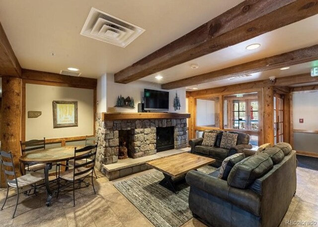 150 Dercum Sq Unit 8501, Keystone, CO 80435 - living area with a fireplace, visible vents, recessed lighting, and beam ceiling