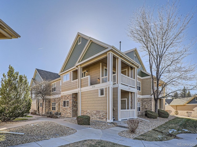 view of home's exterior featuring a balcony