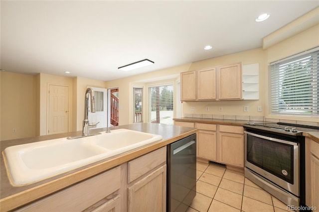 753 County Road 830 Unit 1, Fraser, CO 80442 - kitchen with appliances with stainless steel finishes, light brown cabinetry, a sink, light tile patterned floors, and recessed lighting