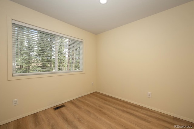 753 County Road 830 Unit 1, Fraser, CO 80442 - empty room featuring plenty of natural light, baseboards, and light wood-type flooring