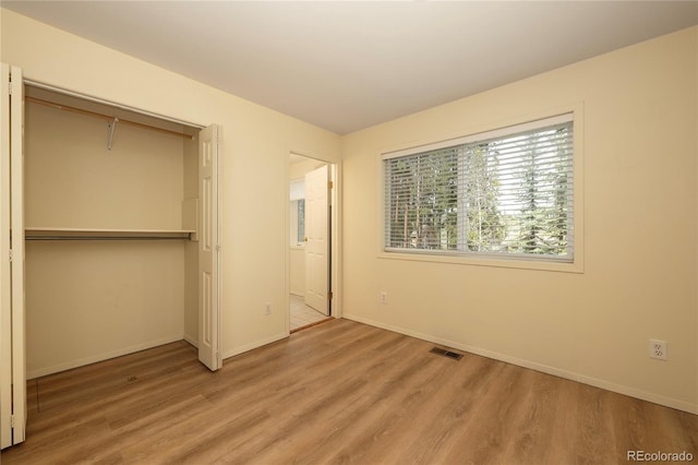 753 County Road 830 Unit 1, Fraser, CO 80442 - unfurnished bedroom featuring light wood-style flooring, baseboards, and a closet