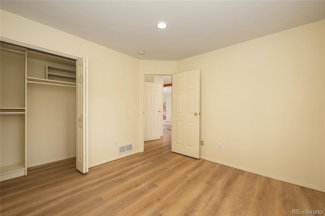 753 County Road 830 Unit 1, Fraser, CO 80442 - unfurnished bedroom with wood finished floors, a closet, baseboards, and recessed lighting