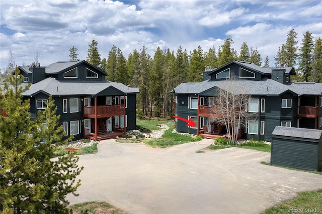 753 County Road 830 Unit 1, Fraser, CO 80442 - multi unit property with a balcony, roof with shingles, and stairs