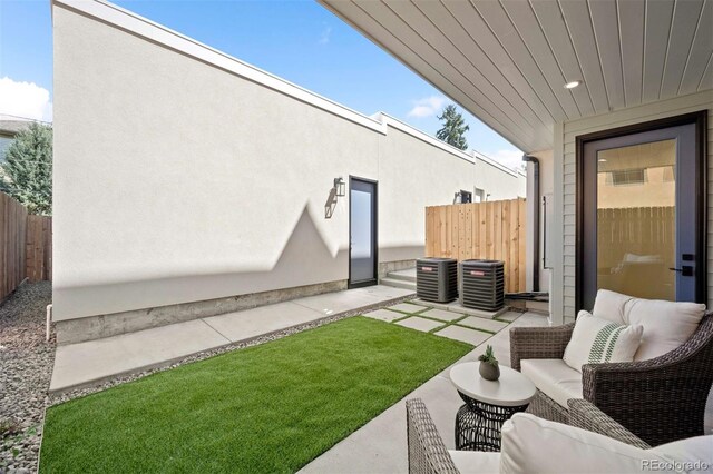 view of patio / terrace featuring an outdoor hangout area and central AC unit