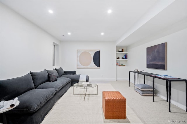 living room featuring light colored carpet