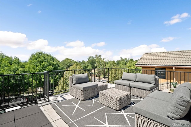 view of patio / terrace with a balcony