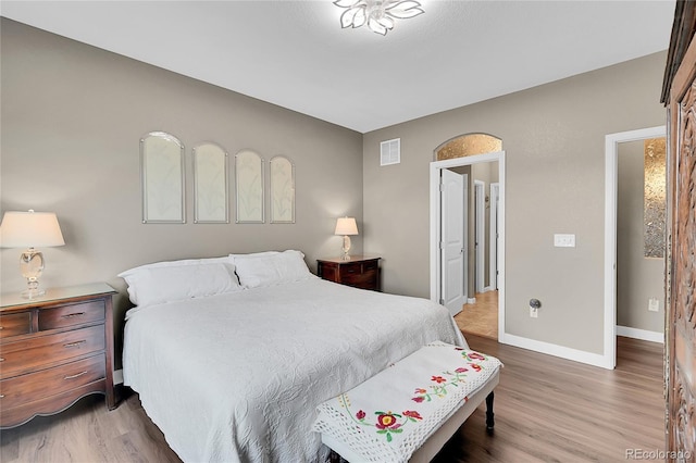 bedroom featuring hardwood / wood-style floors