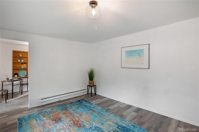 517 Canon Ave, Manitou Springs, CO 80829 - living area with baseboard heating and wood finished floors