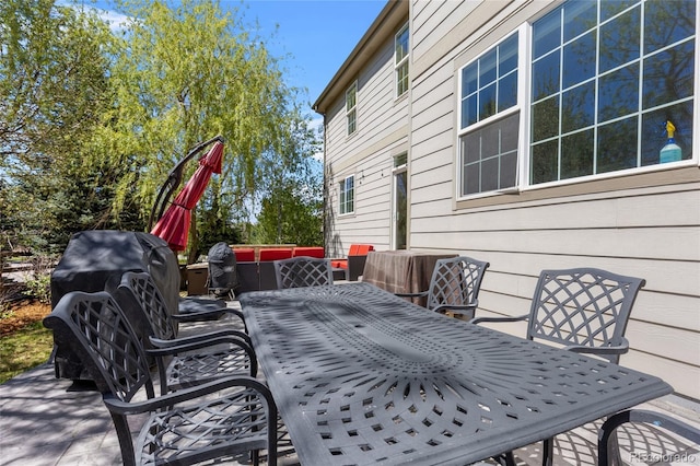 view of patio with outdoor dining area
