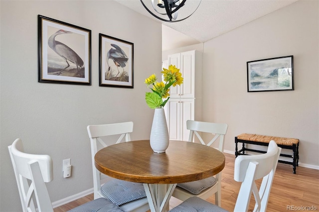 7 Shetland Ct, Highlands Ranch, CO 80130 - dining space with light wood finished floors and baseboards