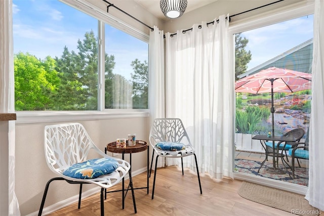 7 Shetland Ct, Highlands Ranch, CO 80130 - sitting room with baseboards, healthy amount of natural light, and wood finished floors