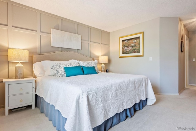 7 Shetland Ct, Highlands Ranch, CO 80130 - bedroom featuring light carpet, a decorative wall, and baseboards