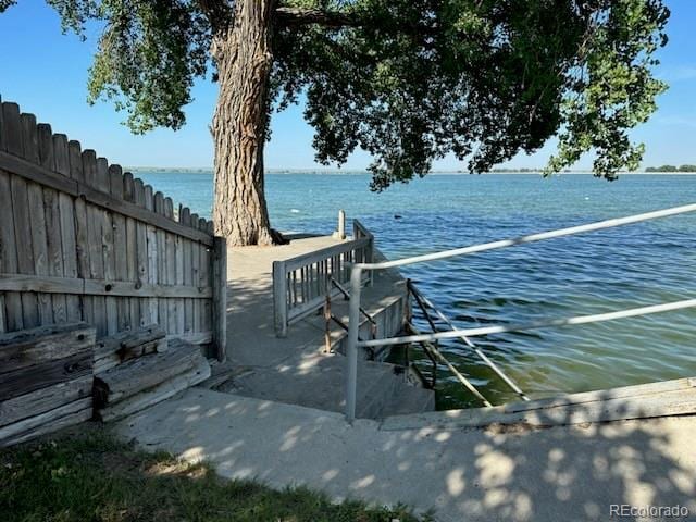 view of dock with a water view