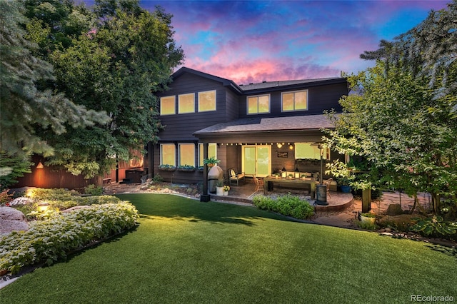 9856 Glenstone Trl, Highlands Ranch, CO 80130 - rear view of house with a patio area and outdoor lounge area