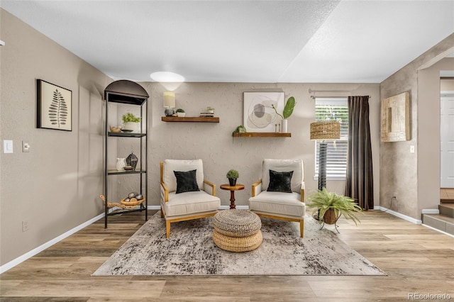9856 Glenstone Trl, Highlands Ranch, CO 80130 - sitting room with wood finished floors and baseboards