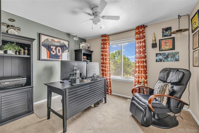 9856 Glenstone Trl, Highlands Ranch, CO 80130 - home office with a ceiling fan, carpet flooring, and a textured ceiling