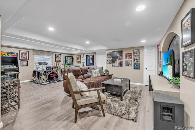 9856 Glenstone Trl, Highlands Ranch, CO 80130 - living room featuring light wood-type flooring, a tray ceiling, and recessed lighting