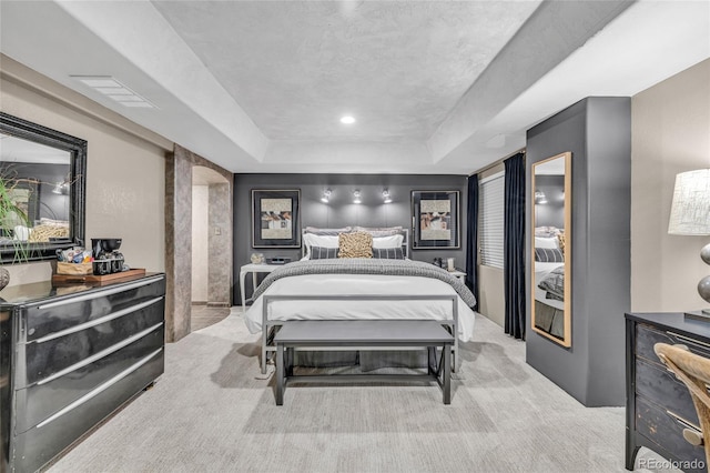 9856 Glenstone Trl, Highlands Ranch, CO 80130 - carpeted bedroom featuring a tray ceiling and arched walkways