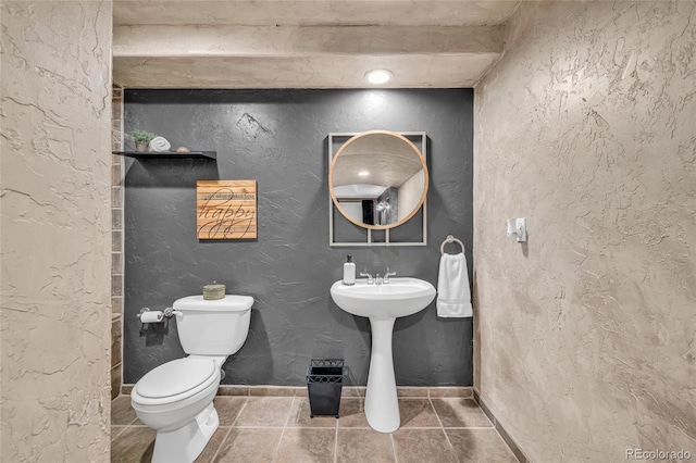 9856 Glenstone Trl, Highlands Ranch, CO 80130 - half bathroom with toilet and tile patterned flooring