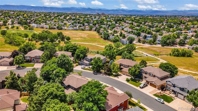 9856 Glenstone Trl, Highlands Ranch, CO 80130 - aerial perspective of suburban area featuring mountains
