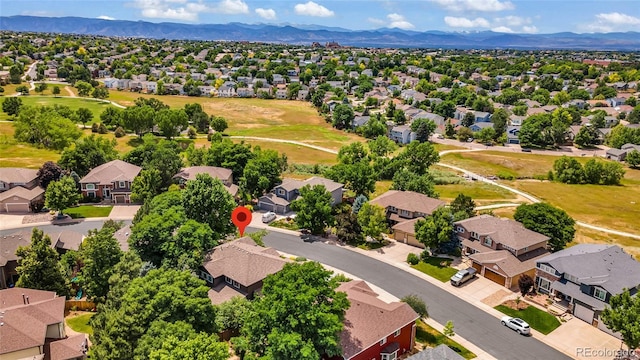 9856 Glenstone Trl, Highlands Ranch, CO 80130 - aerial perspective of suburban area with a mountain backdrop