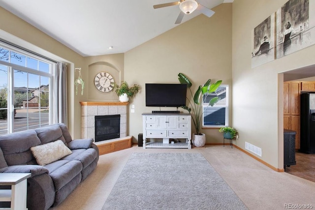 1275 W 50th St, Loveland, CO 80538 - living room featuring carpet floors, a fireplace, ceiling fan, lofted ceiling, and baseboards