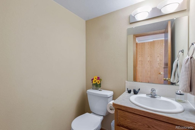 1275 W 50th St, Loveland, CO 80538 - bathroom featuring toilet and vanity