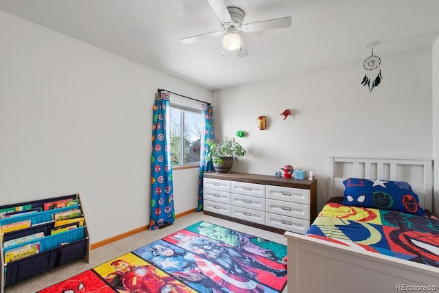 1275 W 50th St, Loveland, CO 80538 - carpeted bedroom featuring baseboards and a ceiling fan