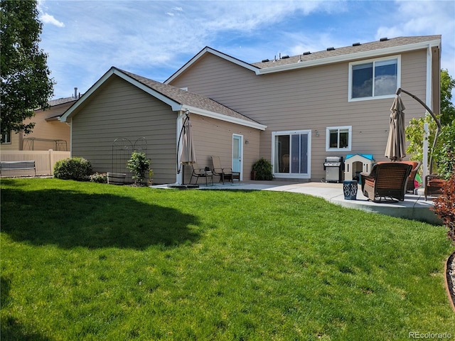 1275 W 50th St, Loveland, CO 80538 - back of property featuring a patio