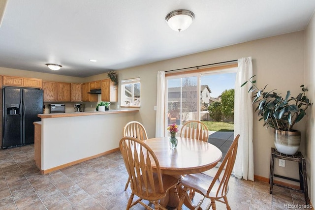 1275 W 50th St, Loveland, CO 80538 - dining area with baseboards