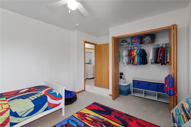 1275 W 50th St, Loveland, CO 80538 - carpeted bedroom with a closet, washer / dryer, and a ceiling fan