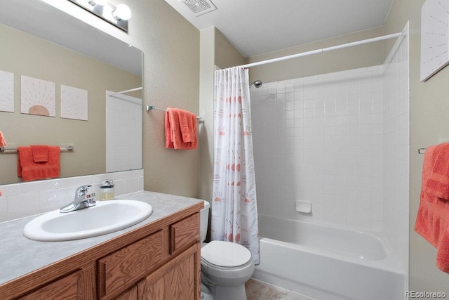 1275 W 50th St, Loveland, CO 80538 - bathroom featuring toilet, shower / bath combination with curtain, and vanity