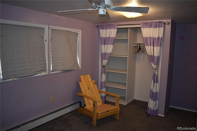 carpeted bedroom featuring a baseboard radiator, a textured ceiling, baseboards, and ceiling fan