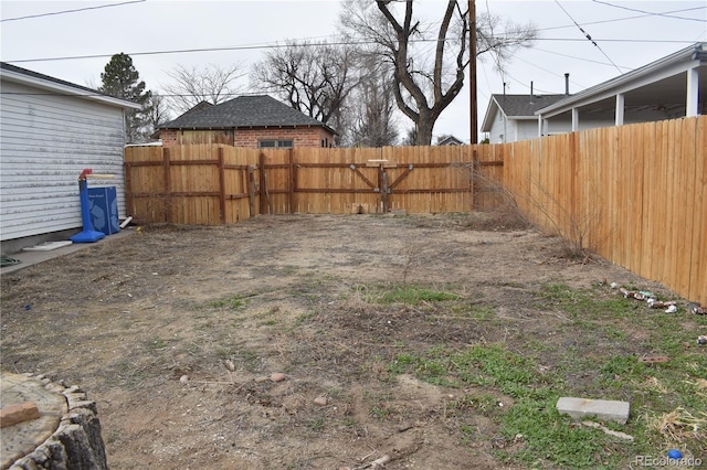view of yard featuring a fenced backyard