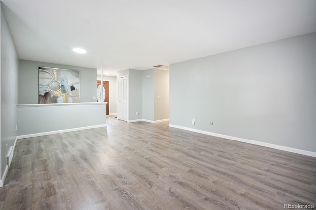 7659 S Holland Way, Littleton, CO 80128 - unfurnished room featuring wood finished floors and recessed lighting