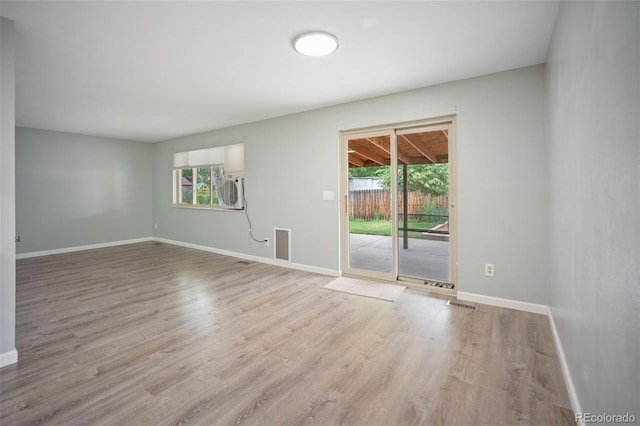 7659 S Holland Way, Littleton, CO 80128 - spare room featuring wood finished floors