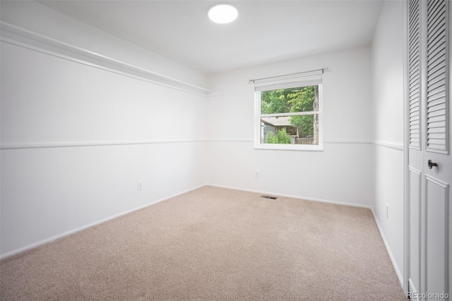 7659 S Holland Way, Littleton, CO 80128 - unfurnished bedroom featuring carpet and a closet